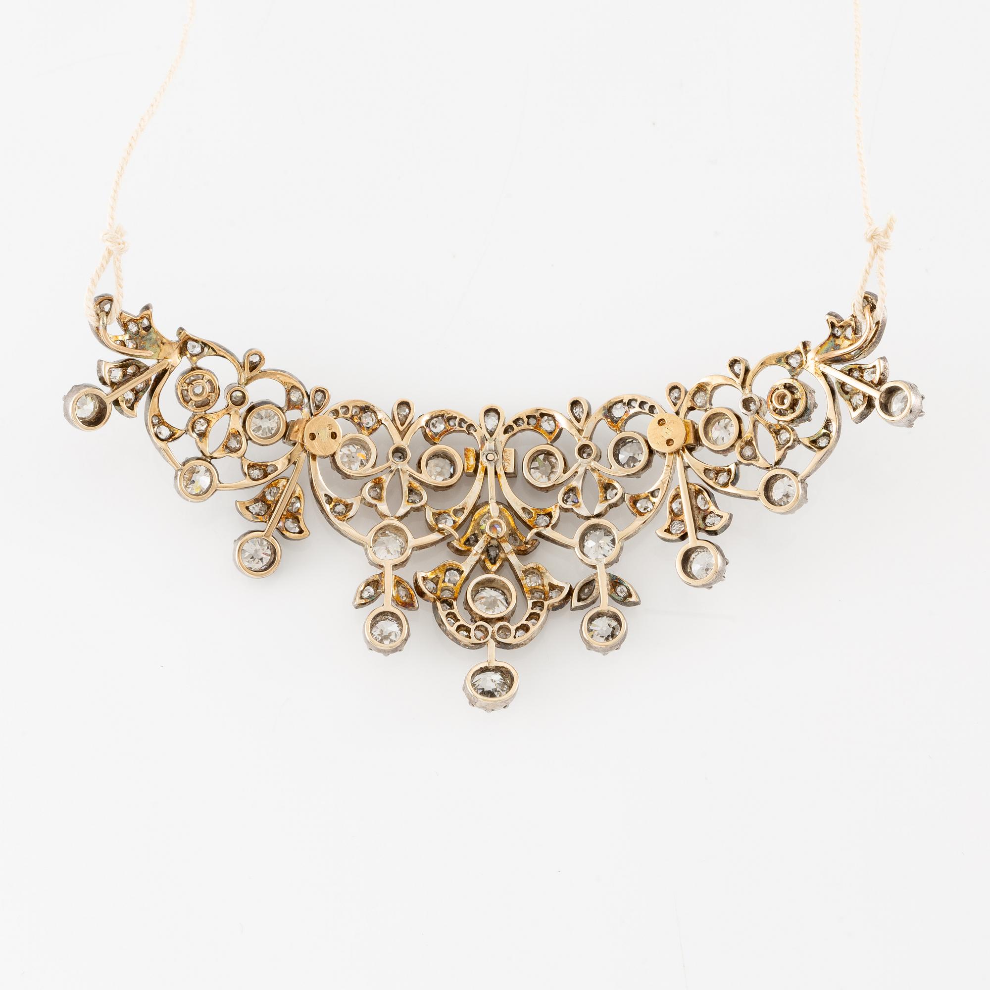 Tiara/brosch/collier, silver med gammalslipade och rosenslipade diamanter.