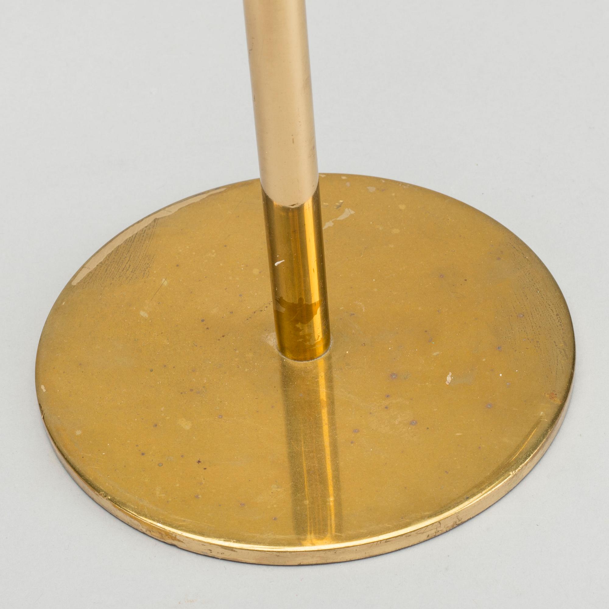HANS-AGNE JAKOBSSON,  a brass candelabra, later part of the 20th century, height 23,5 cm.