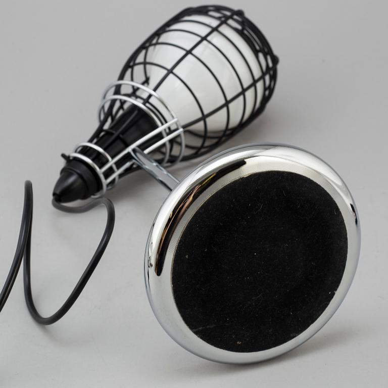 A 'Cage Mic' table light by Diesel for Foscarini.