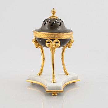 A French Empire ormolu and patinated bronze brûle-parfum, early 19th century.