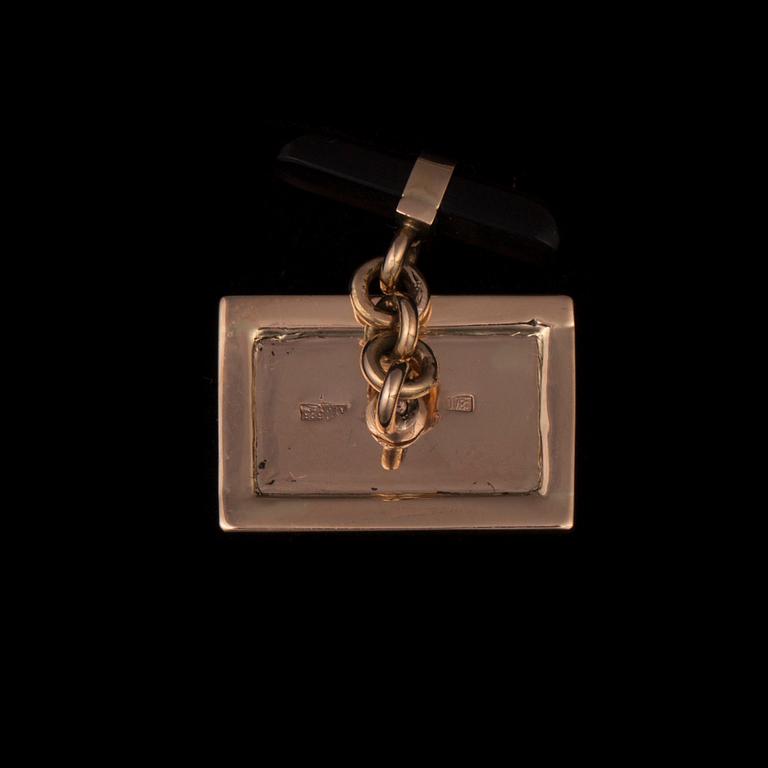 MANSCHETTKNAPPAR, 14K guld, emaljerade, med diamanter 2 x 0,02 ct. Vikt 8,7 g.