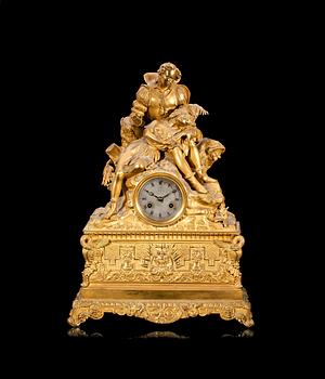 94. A French 1830/40's gilt bronze mantel clock.