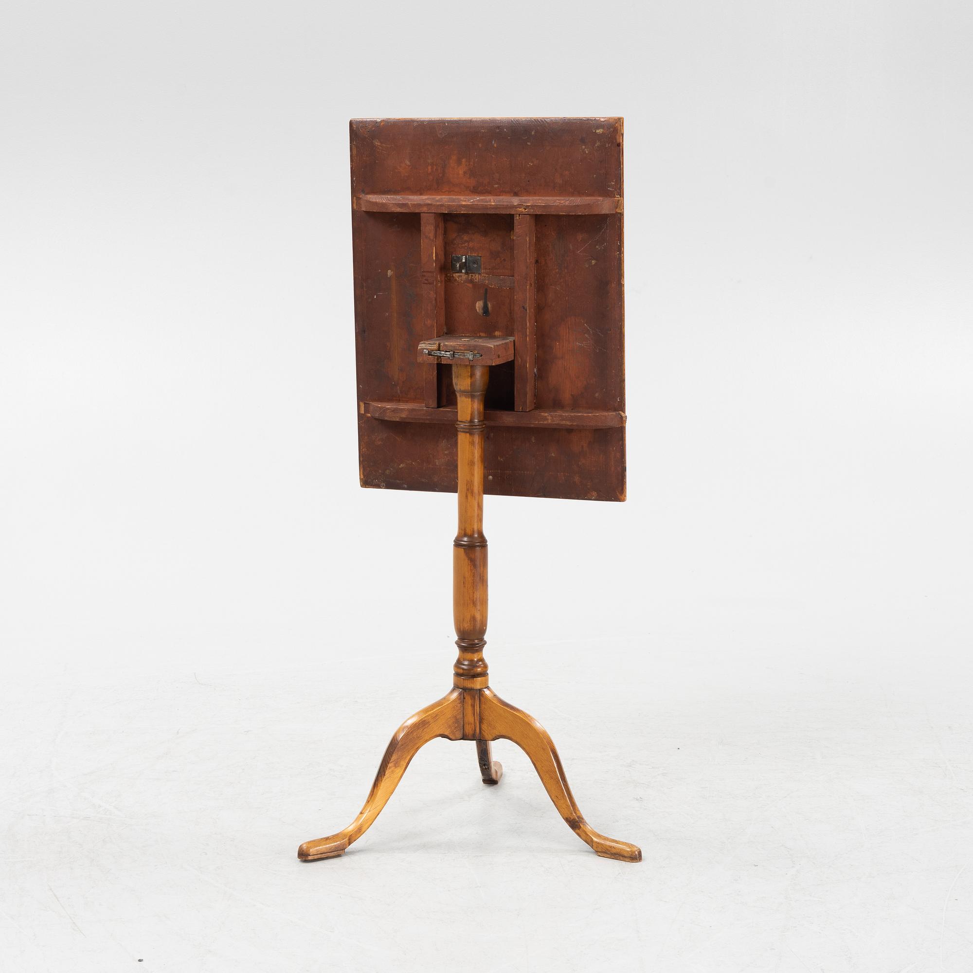 A Swedish alder root veneered tilt top table, early 19th Century.