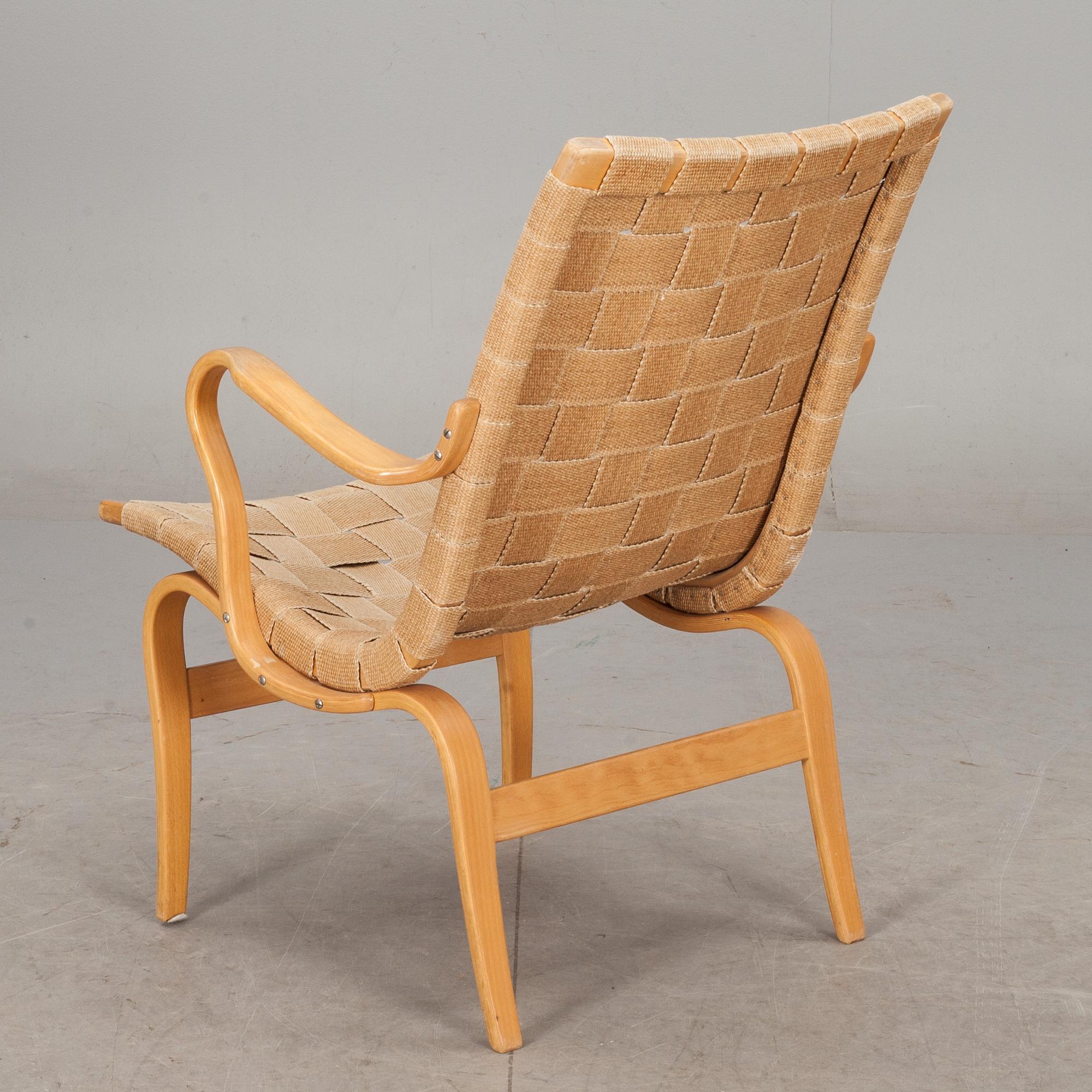 KARMSTOL. "Eva" design Bruno Mathsson för Karl Mathsson. Daterad 1977.