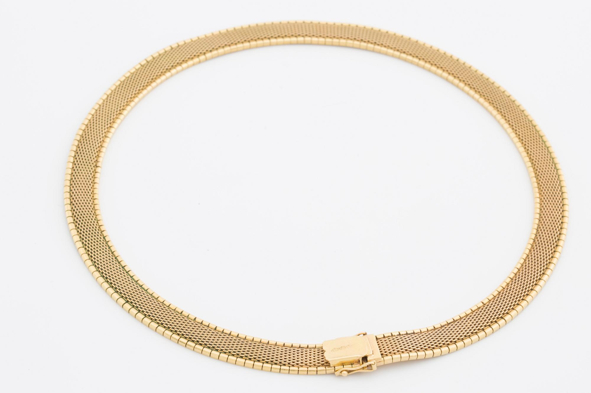 COLLIER, 18K matterat guld.
