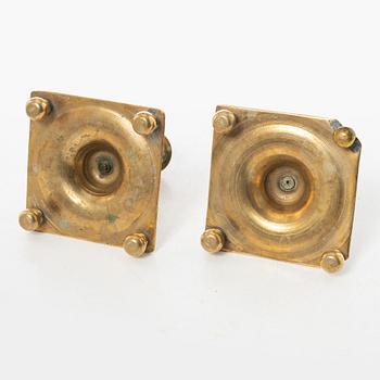 A pair of North European baroque brass candlesticks, circa 1700.