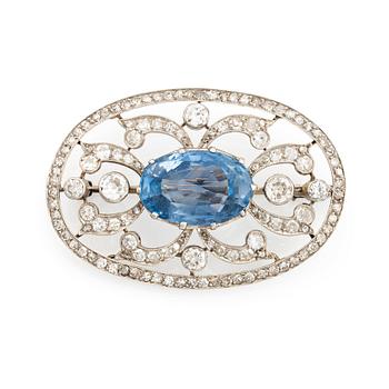 442. A WA Bolin brooch in platinum set with a faceted sapphire and old- and eight-cut diamonds.