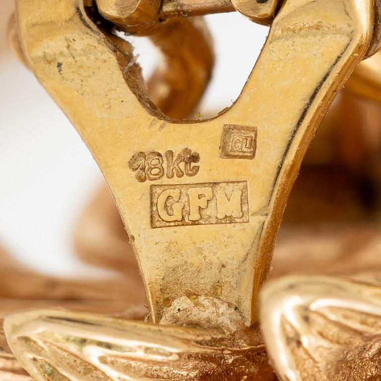 Earrings, 18K gold in the form of leaves.