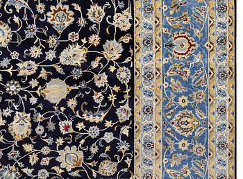 A Kashan carpet of 'Shah Abbas' design, c 376 x 276 cm.