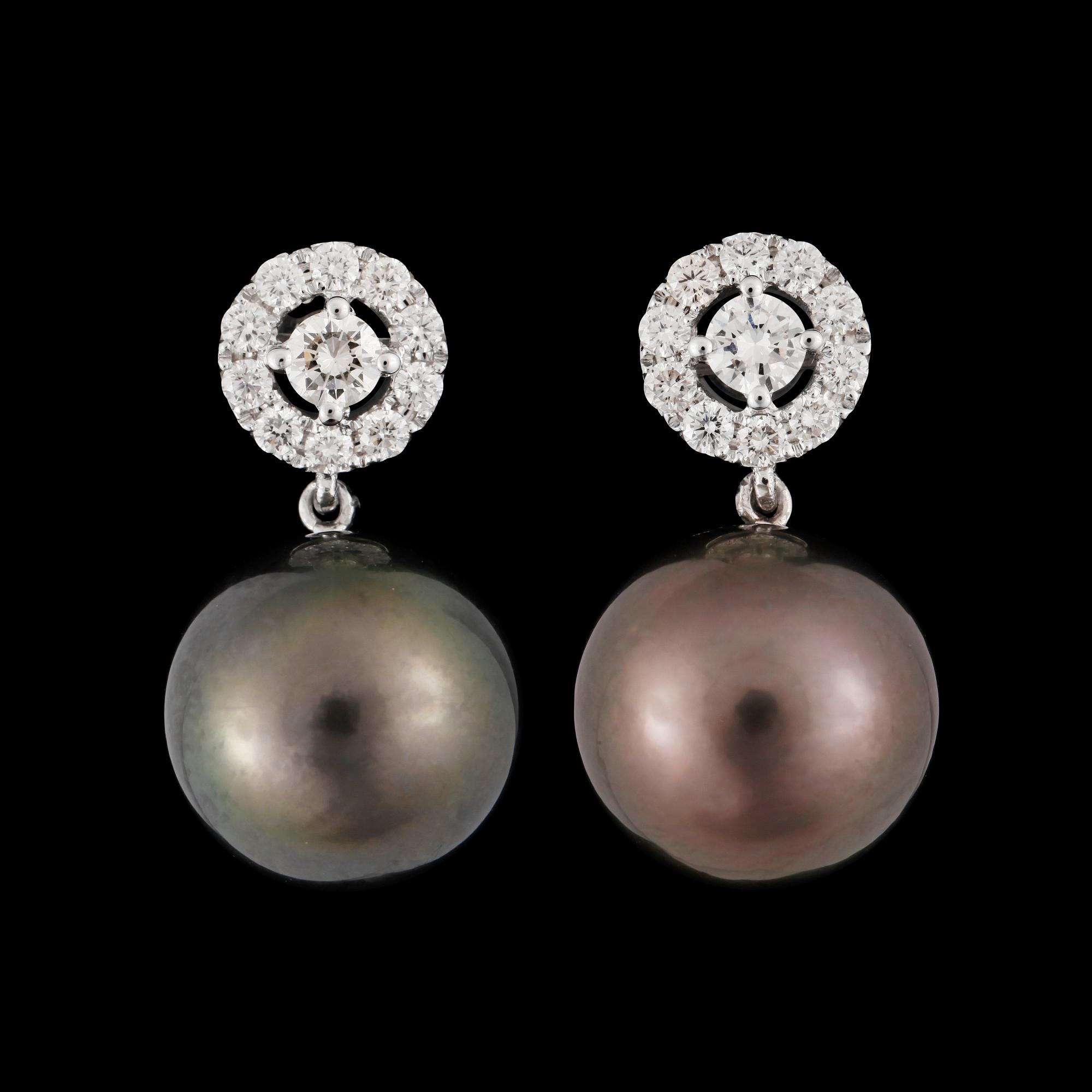 A pair of cultured tahitipearl, 12.6 mm, and diamond, circa 0.70 ct, earrings.