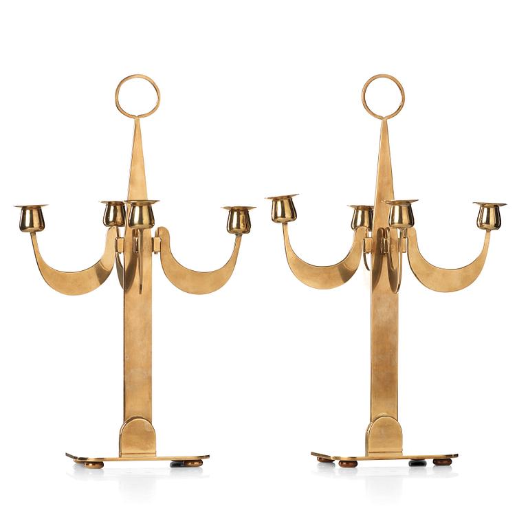 Josef Frank, a pair of brass candelabra by Svenskt Tenn, 1950's, model nr 2663.