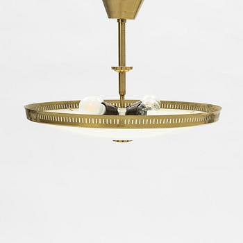A brass and glass ceiling lamp, second part of the 20th Century.