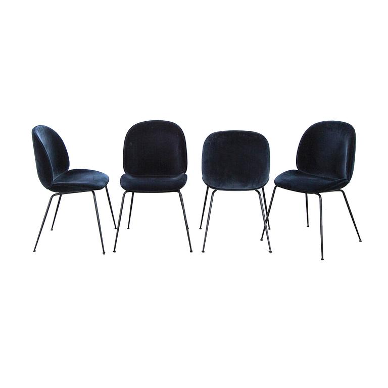 A set of four Beetle dining chairs by Gamfratesi for Gubi 2013.