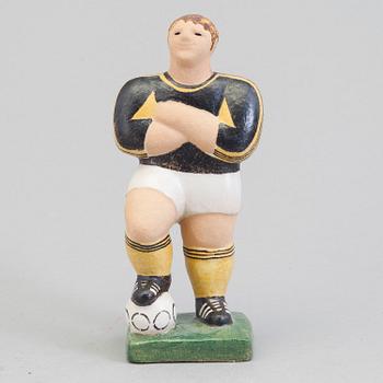 A Lisa Larson figure of a football player, Sweden.