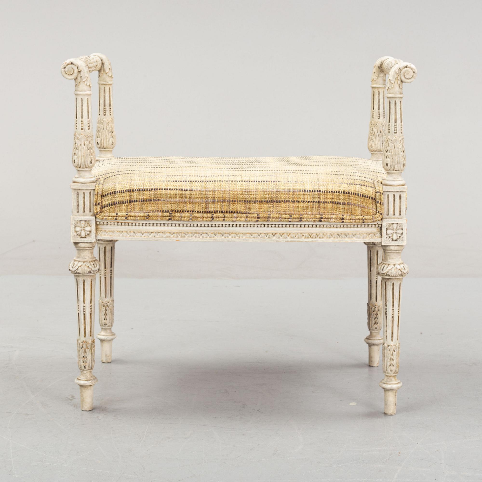 An early 20th Century Louis XVI style banquet stool.