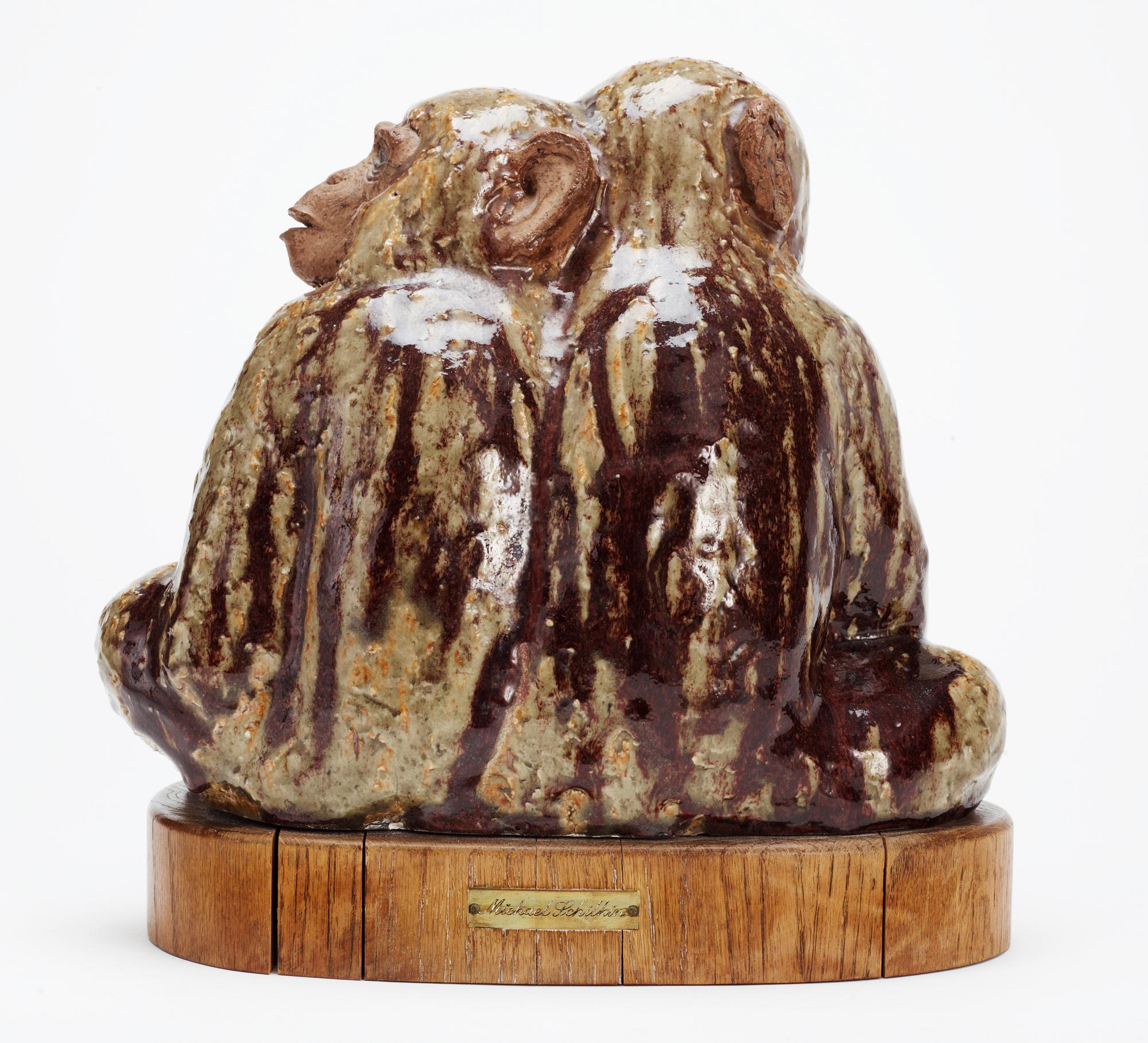 A Michael Schilkin stoneware sculpture of two monkeys, Arabia, Finland.