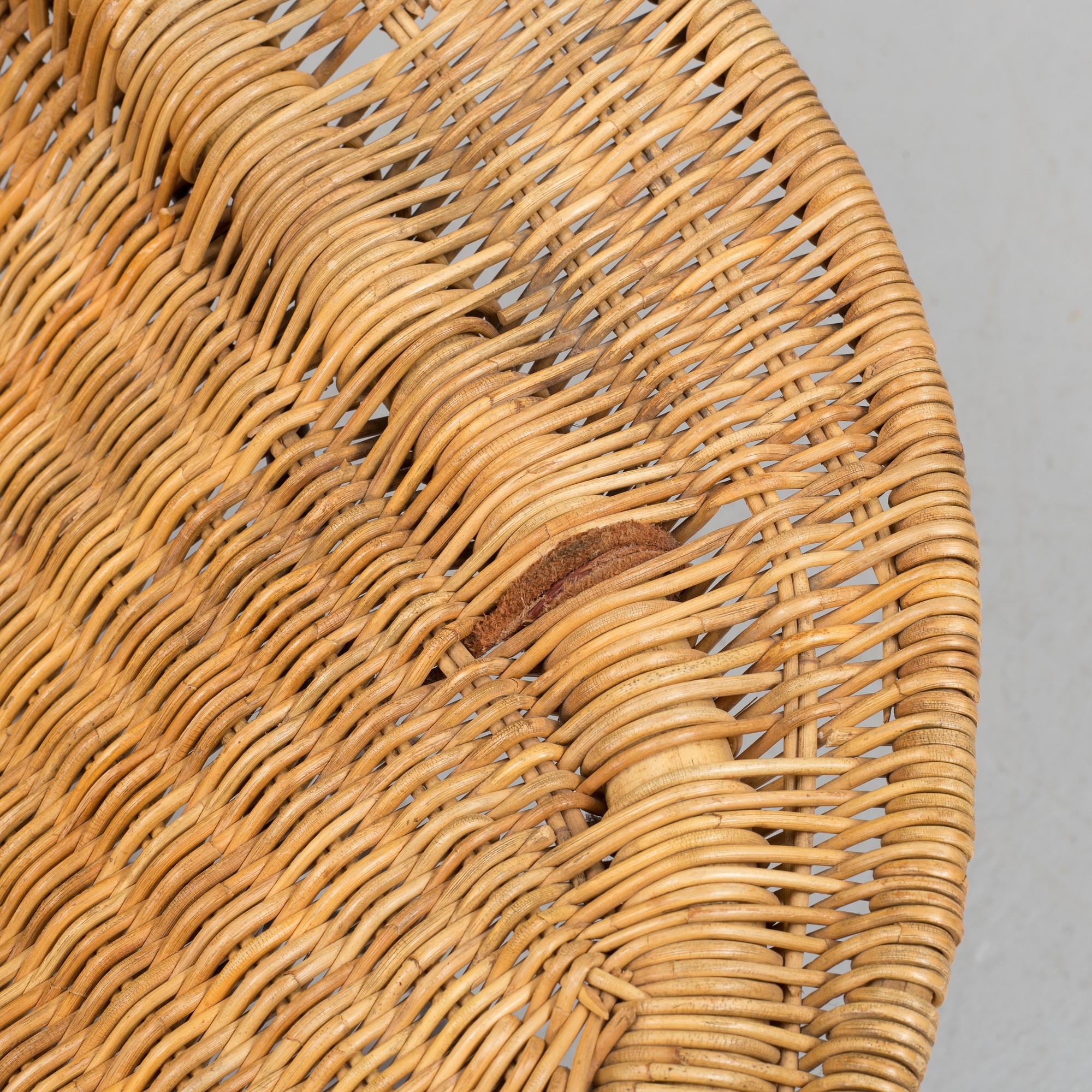 A 'Stora Kraal' rattan easy chair from Nordiska Kompaniet, 1950's.