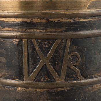 A brass baroque mortar and pestle, 18th century.