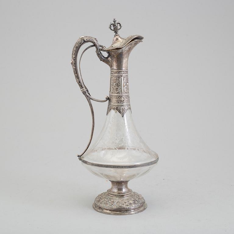 A glass and silver caraffe by Gustaf Möllenborg, Stockholm 1881.