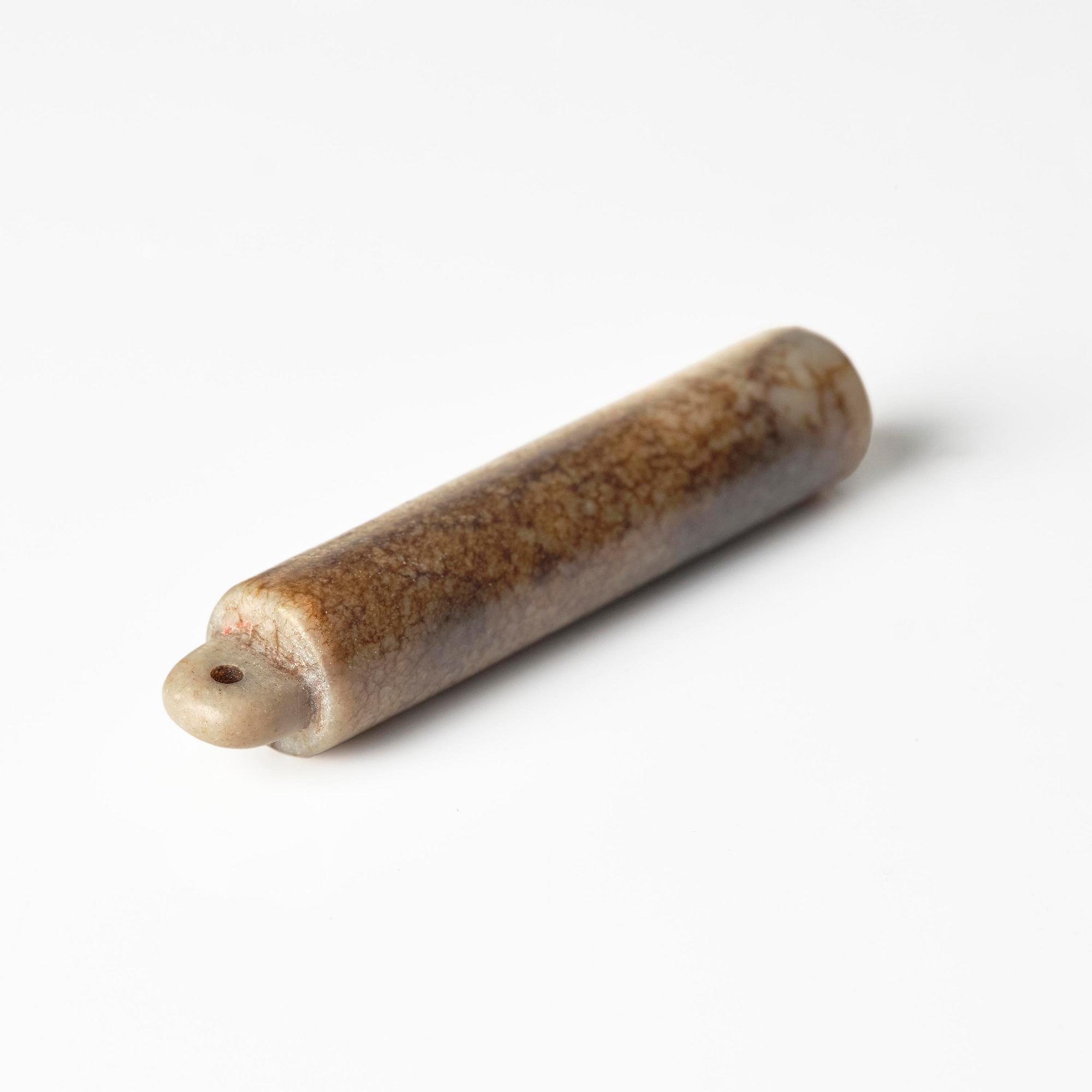 Two boxes with a mandarin's summer hat and black satin autumn hat and feather with six mandarin hat insignias.