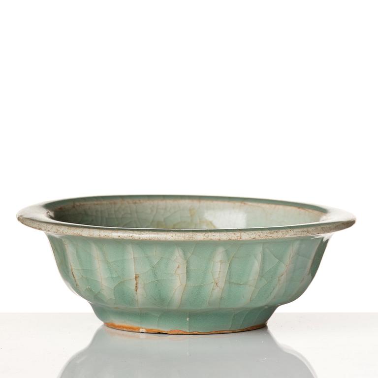 A celadon glazed double fish bowl, Yuan dynasty.