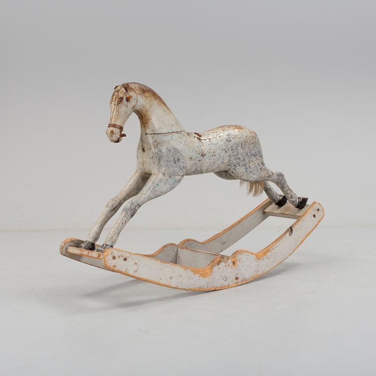 A painted rocking horse second half of the 19th century.