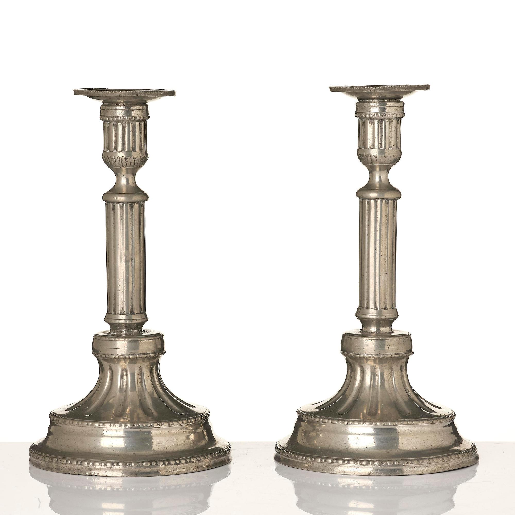 A pair of Gustavian pewter candlesticks by P. Gillman, Stockholm 1786.