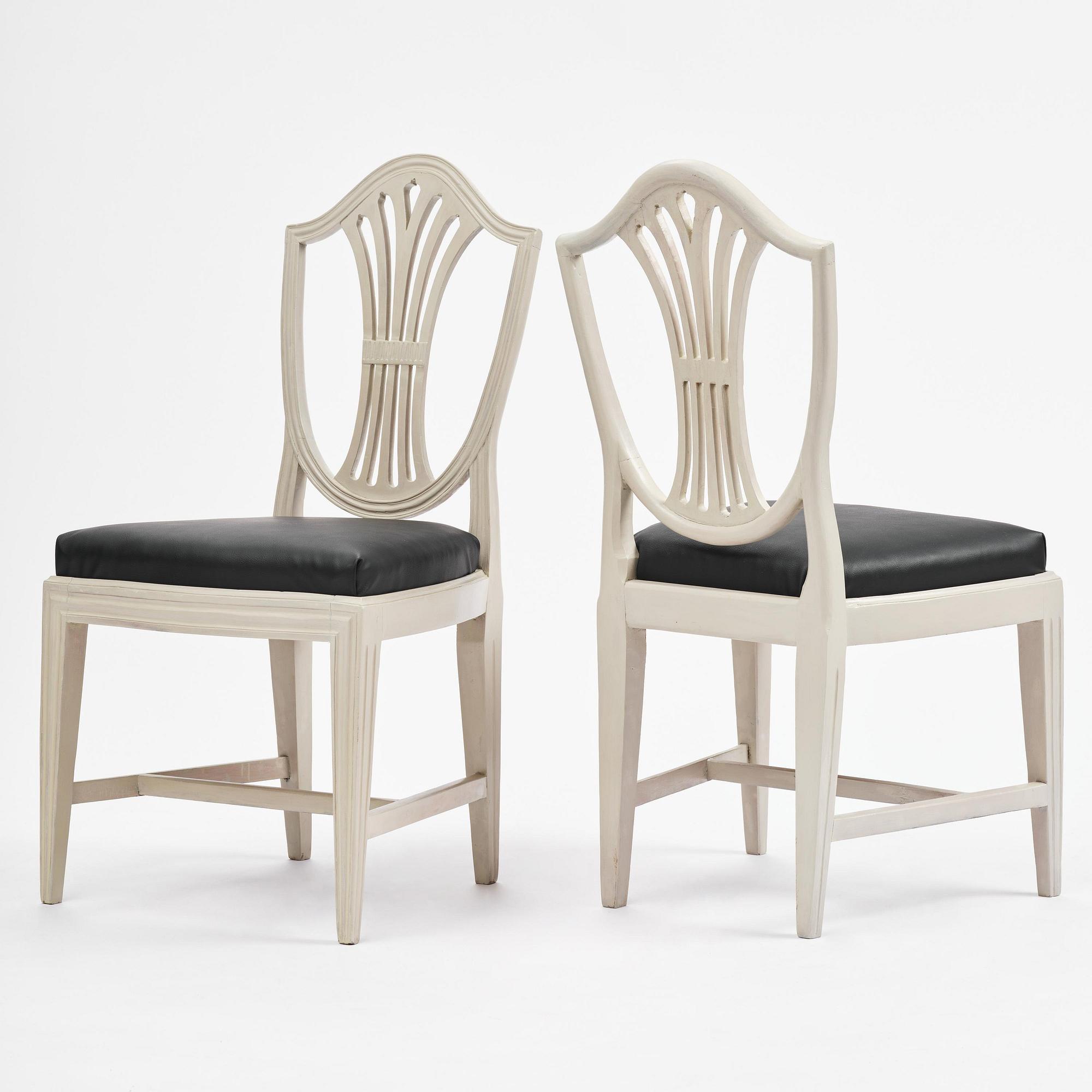 A set of eight late Gustavian chairs by J. E. Höglander (master in Stockholm 1777-1813).