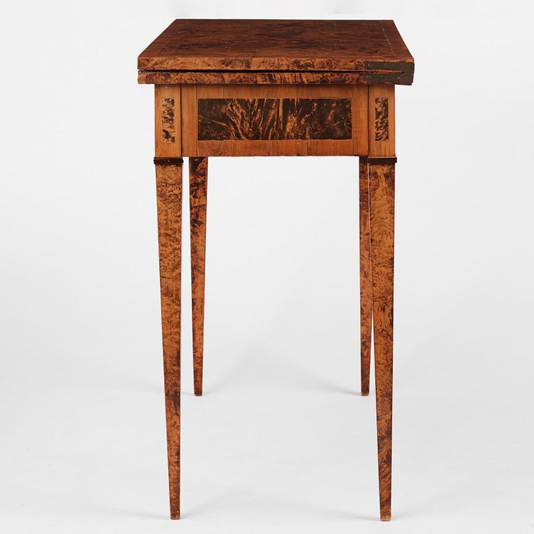 A late Gustavian burr-alder cards table, Mälardalen, late 18th century.