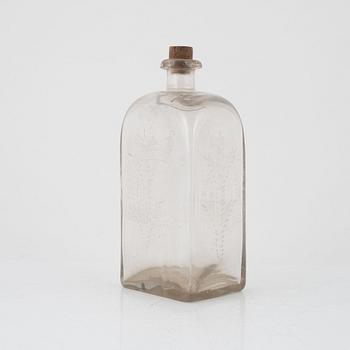 An engraved glass bottle, Limmareds Glasbruk, Sweden, 18th century.