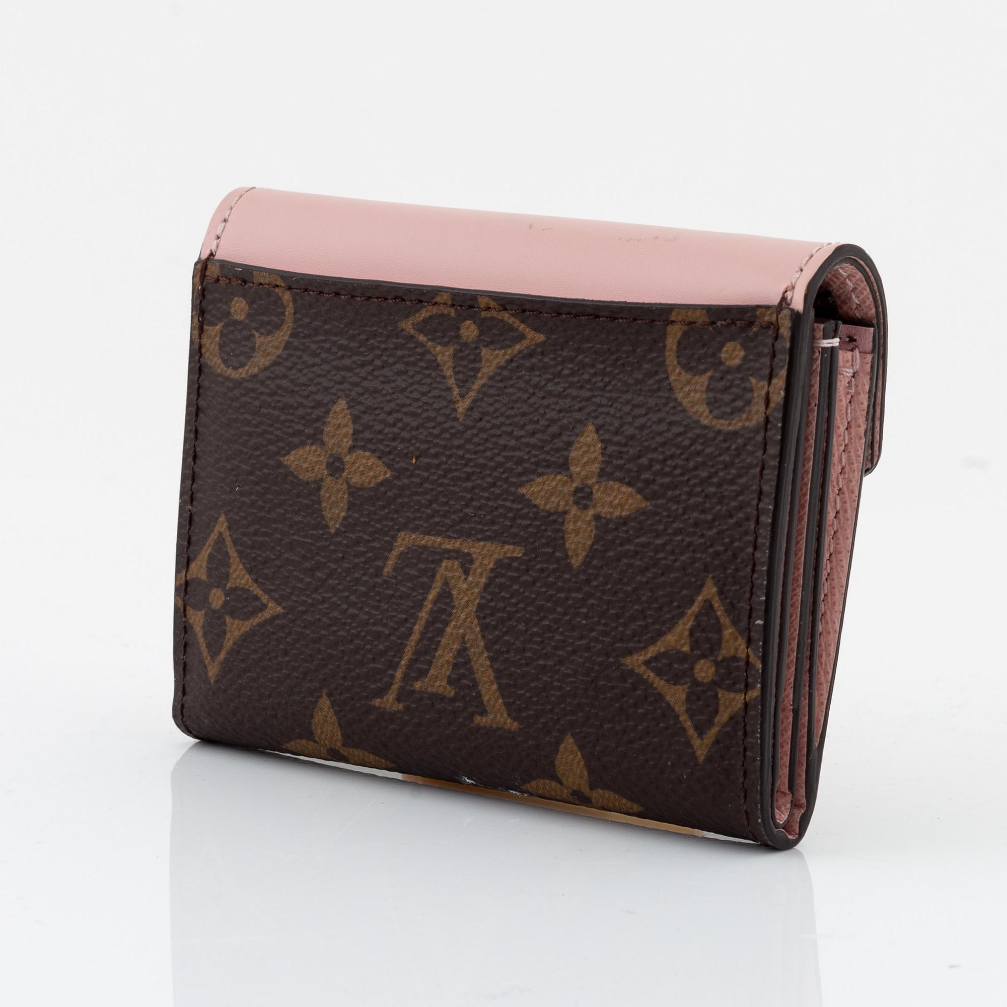 Louis Vuitton a monogram canvas and pink leather Zoe wallet 2020. Bukowskis