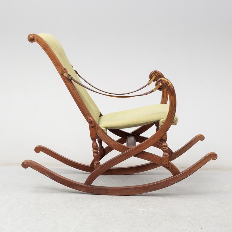 a late 19th century rocking chair.