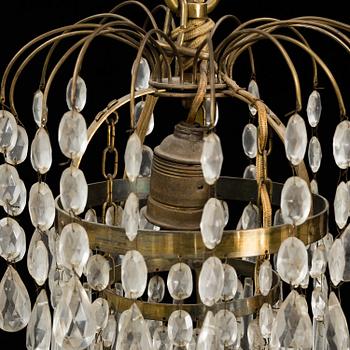 A mid 20th century empire style chandelier.