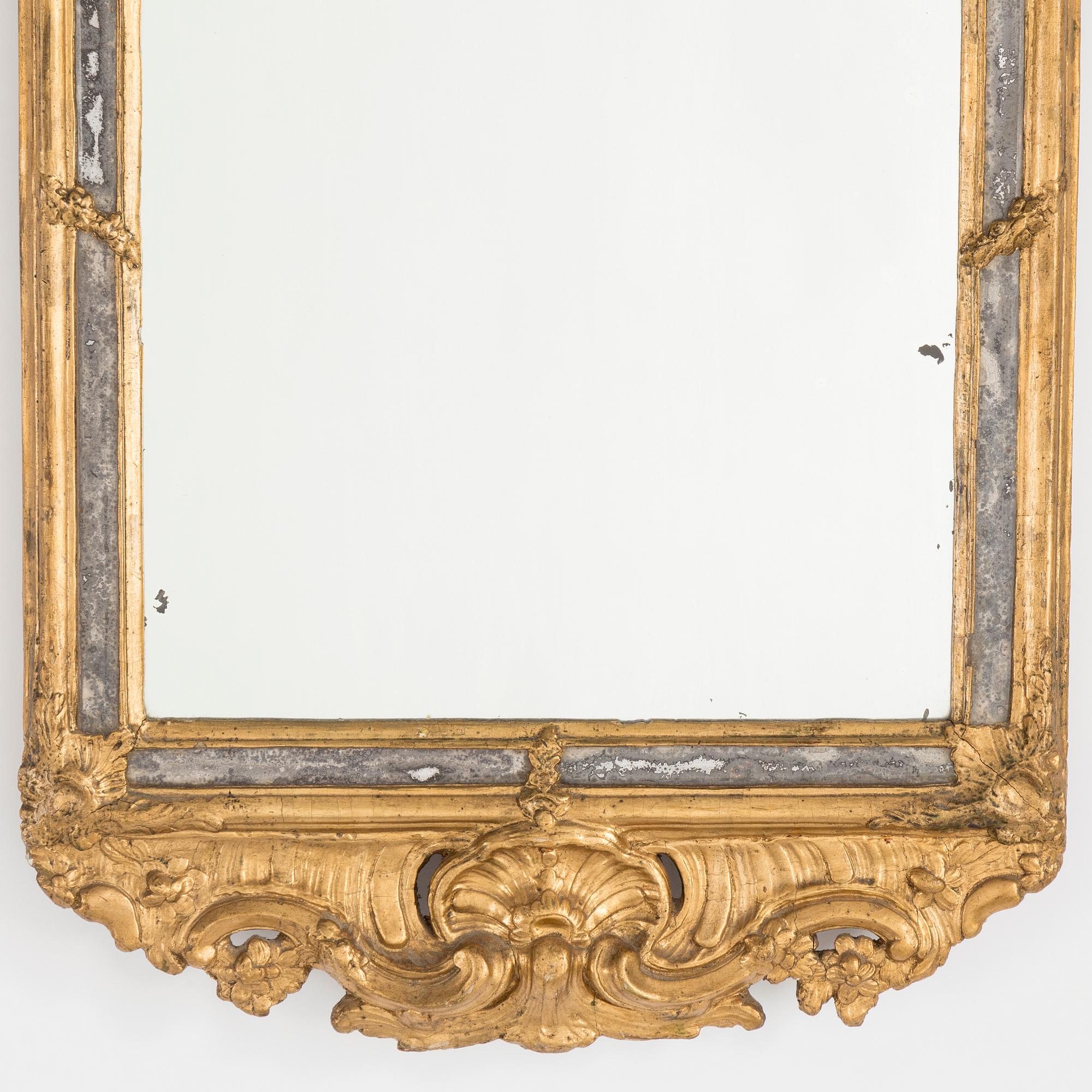 A mid 18th century rococo mirror.
