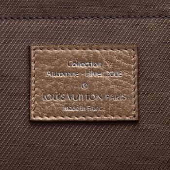 Louis Vuitton, a shimmer 'Halo' bag.