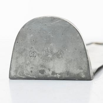 Nils Fougstedt, a matched pair of pewter and brass wall sconces, model A 60, Svenskt Tenn, Stockholm 1929 and 1932.