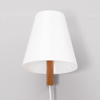 a 1960s wall lamp made by Sanka for Stockmann.