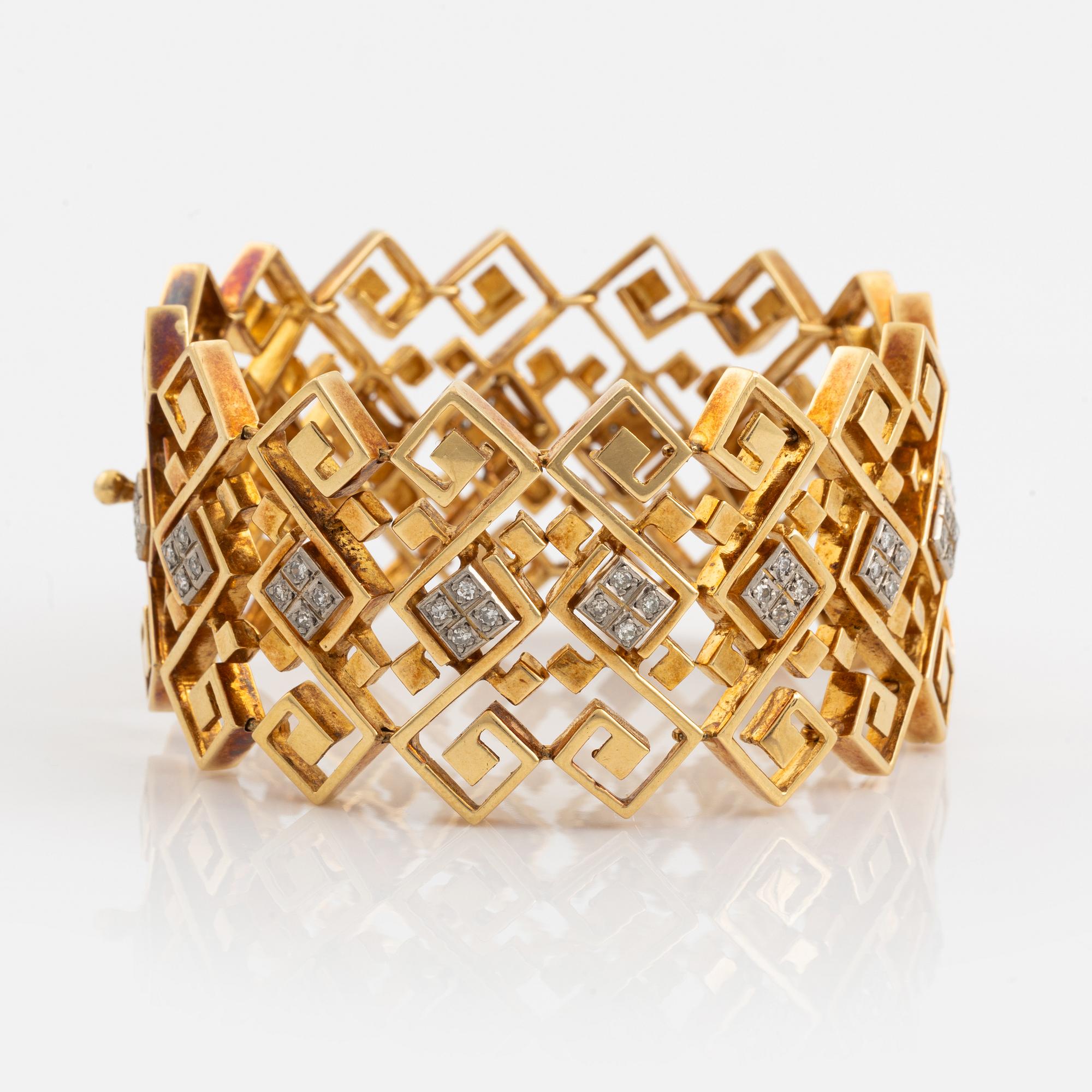 An Ilias Lalounis 18K gold bracelet set with eight-cut diamonds.