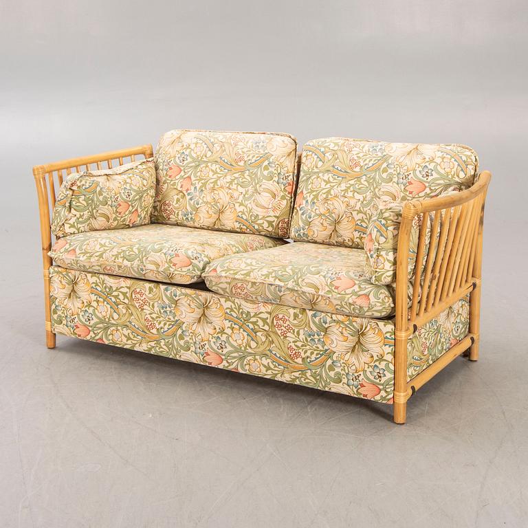 A bamboo and rattan sofa later  part of the 20th century.