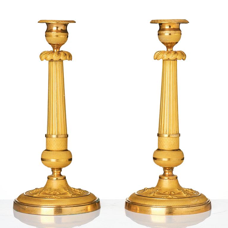 A pair of Empire ormolu three light Candelabra.