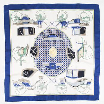 Hermès, a 'Les Voitures à Transformation' silk scarf.