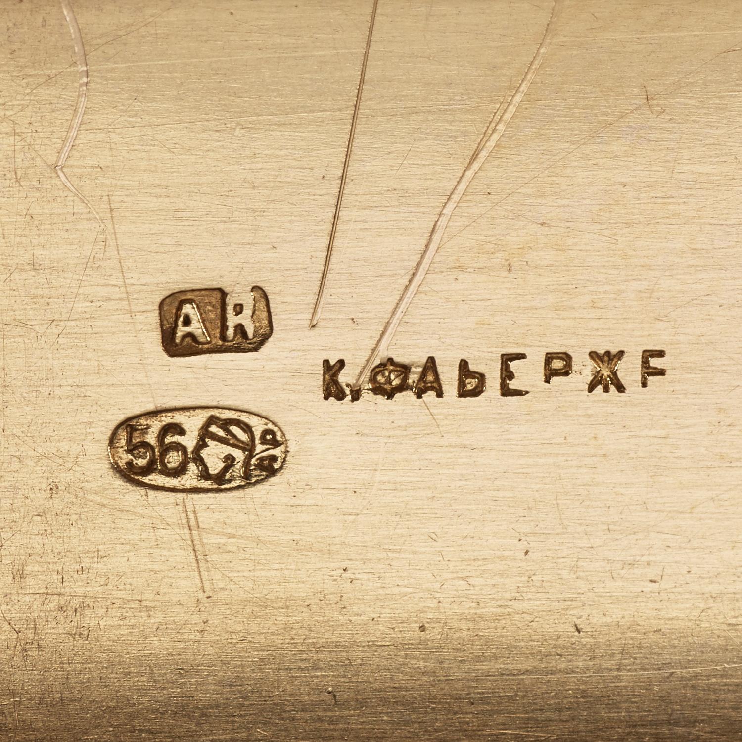 A Fabergé early 20th century gold match-case, workmaster Anna Ringe, S:t Petersburg 1899-1908.