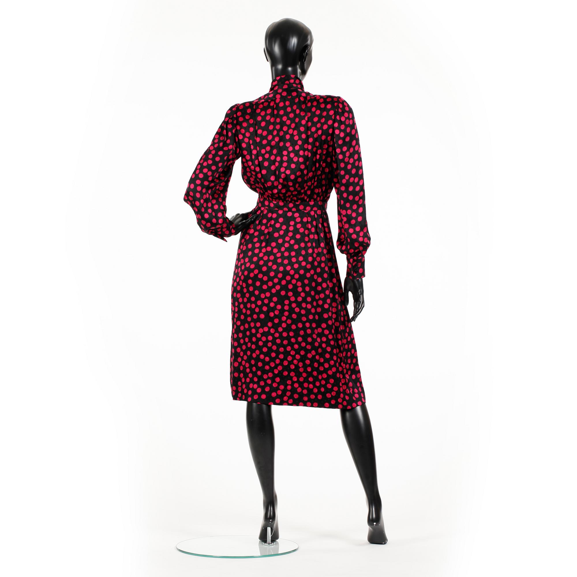 YVES SAINT LAURENT, a black and red silk dress.