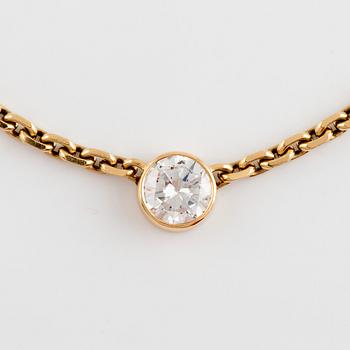 Collier 18K guld med en gammalslipad diamant.