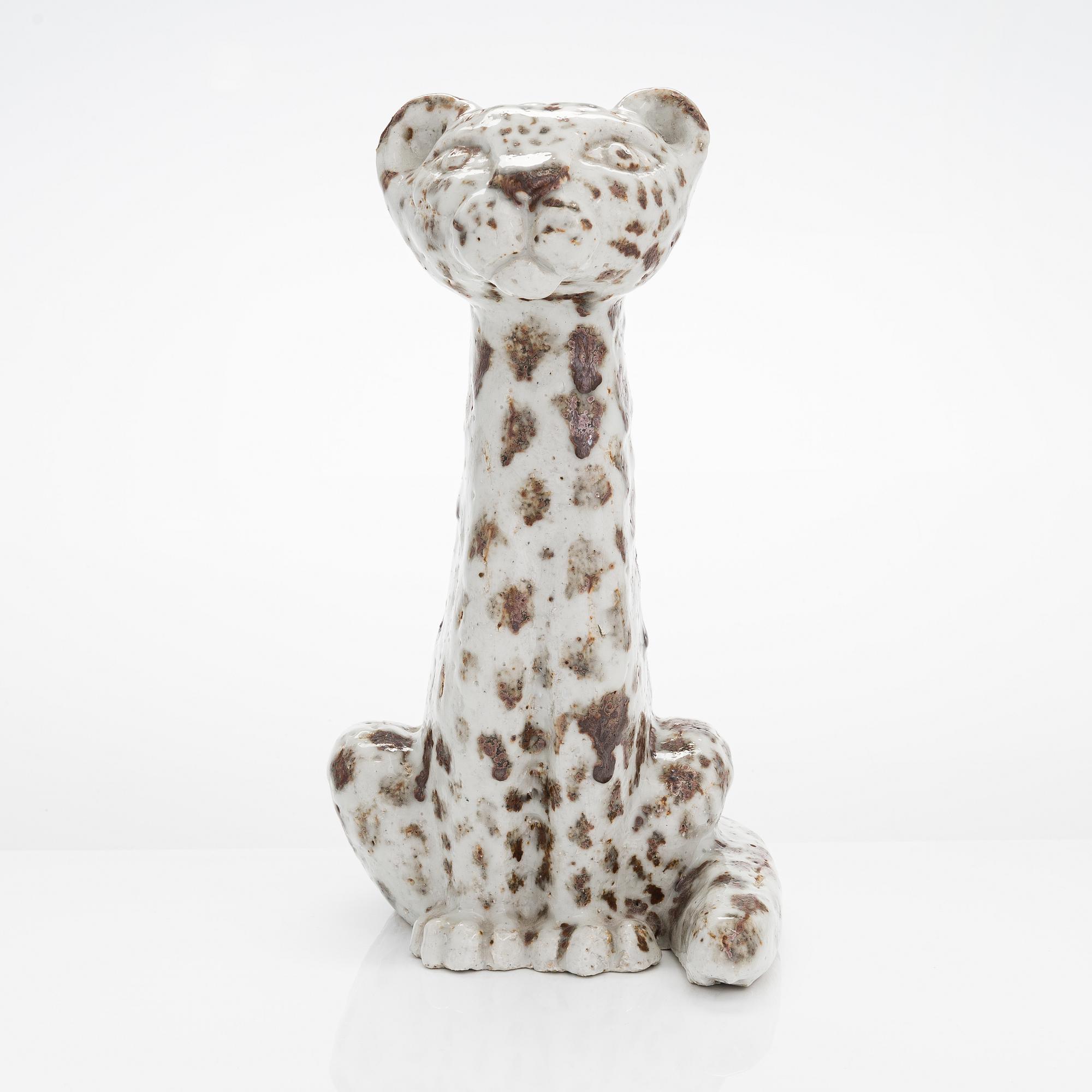 Taisto Kaasinen, a stoneware sculpture signed T. Kaasinen.