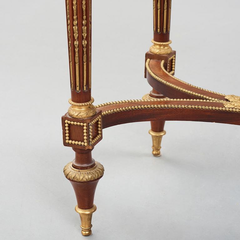 A Louis XVI-style late 19th century table.