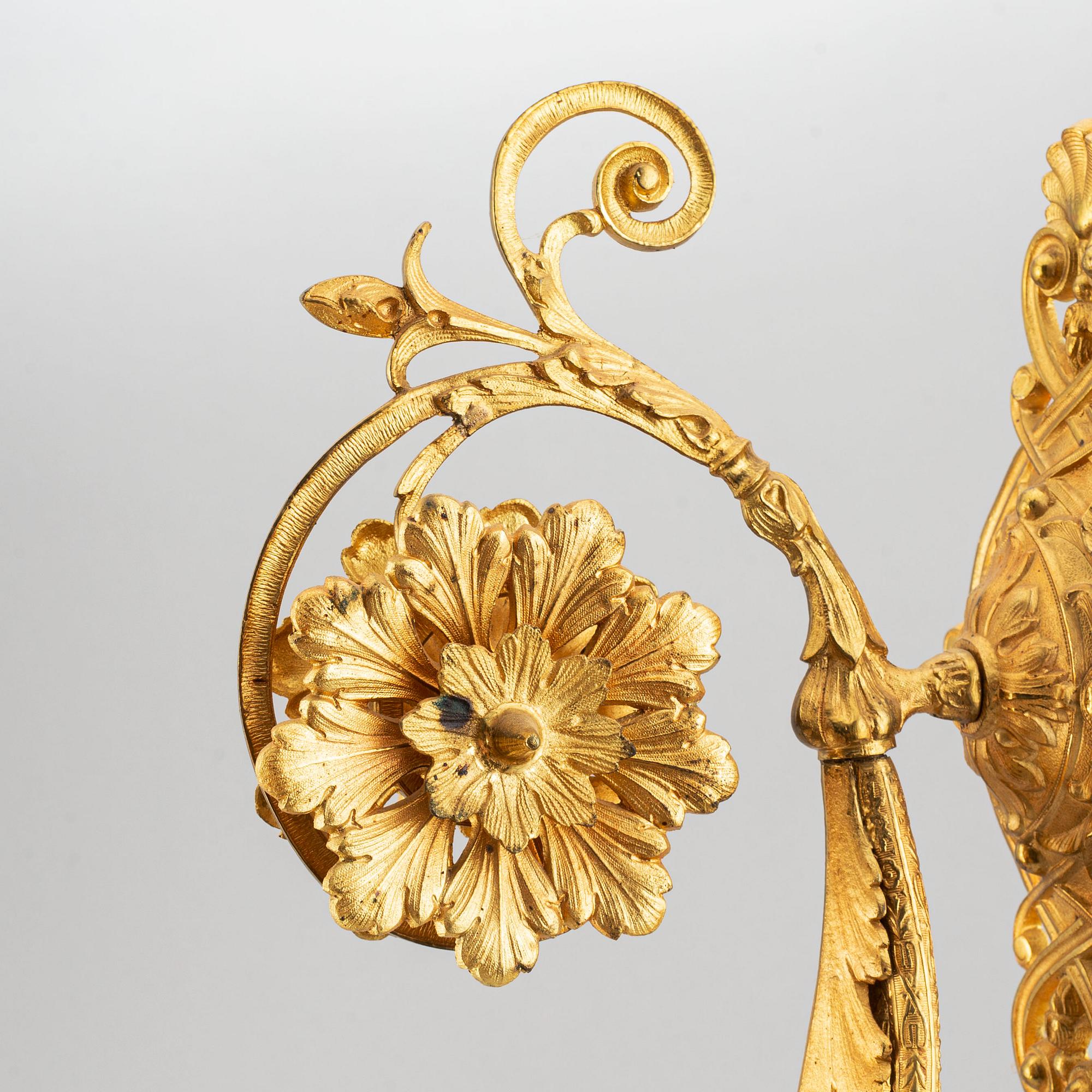 A pair of wall sconces from the late 19th century.