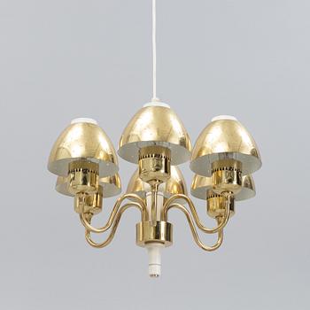 Hans-Agne Jakobsson, a 'T526' brass and wood ceiling light from Markaryd.