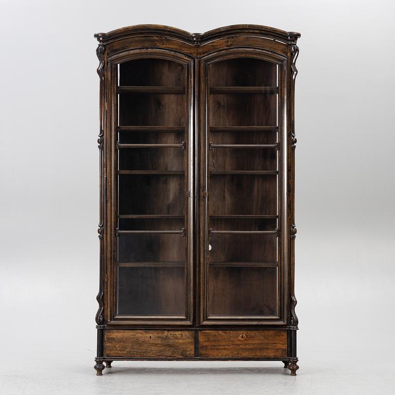 A book cabinet, around 1900.
