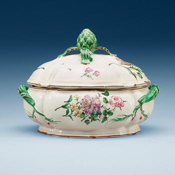 814. An unmarked faience tureen with cover, 18th Century.